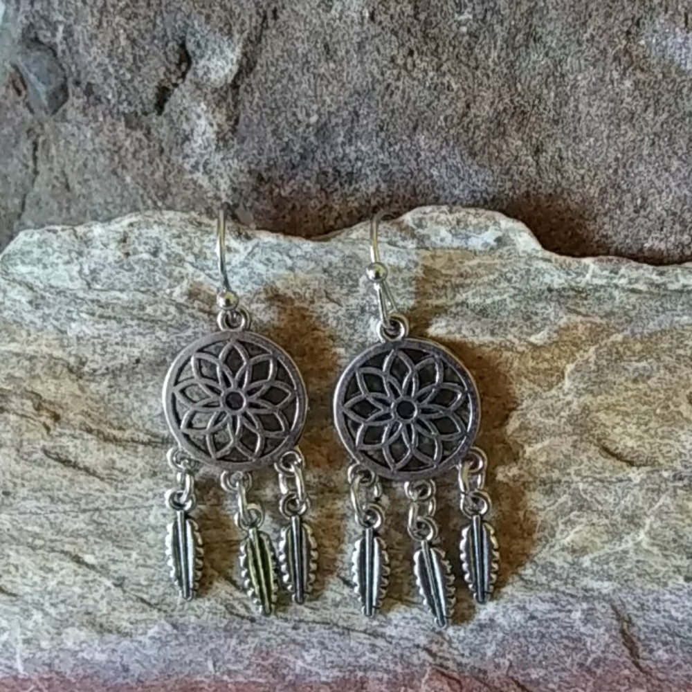Mandela and Feather Silver Tone Earrings New